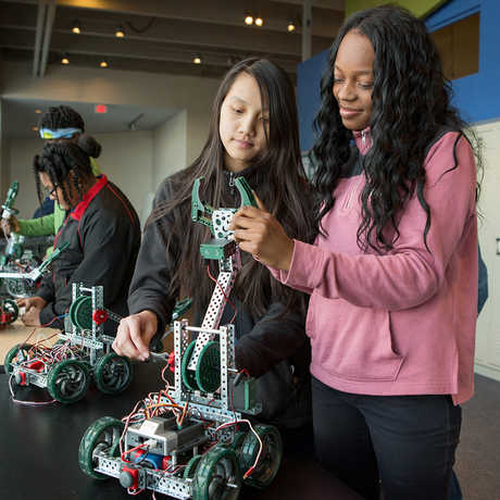 Students working on a robot