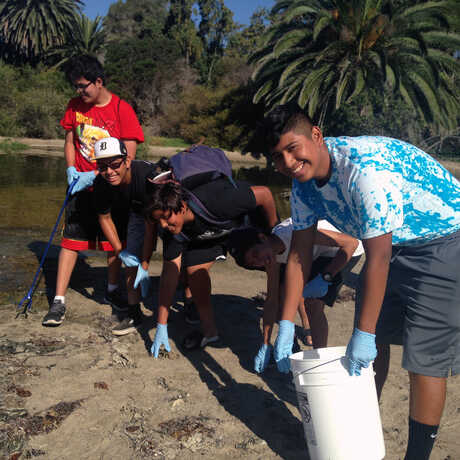 Volunteers clean up trash at a California park during Coastal Cleanup Day