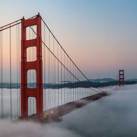 Fog-shrouded Golden Gate Bridge. Photo by Leo Visions