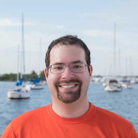 Dr. David Shiffman in front of a marina