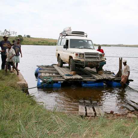 Fisher's expedition jeep floats on a homemade raft