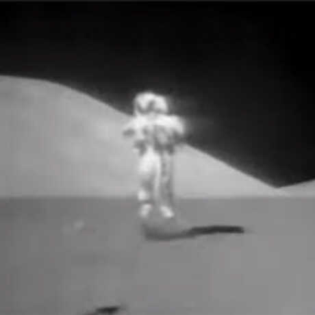 Black and white photo of astronaut on Moon