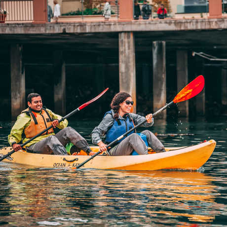 Couple kayaking in Monterey Bay
