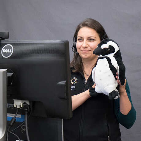Educator with stuffed penguin