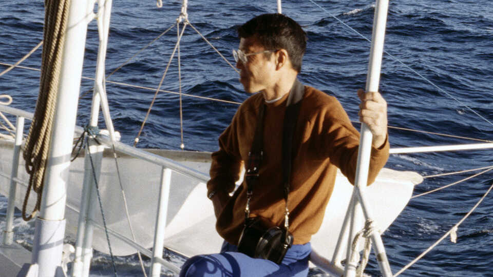 Gordon Chan on a boat with Liz Baja
