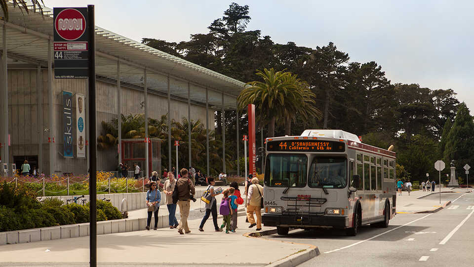 Muni bus 44 in front of the California Academy of Sciences building. 